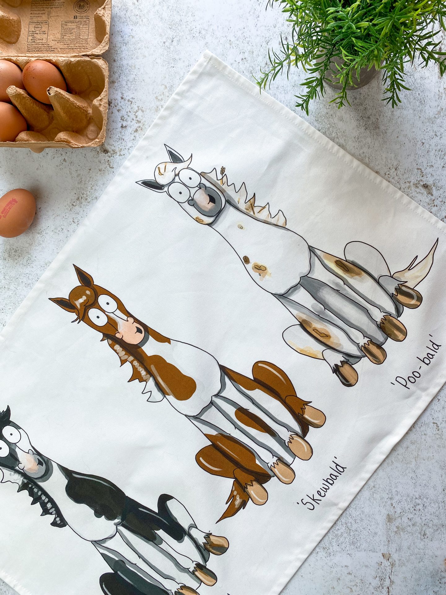 Poo-bald Tea Towel