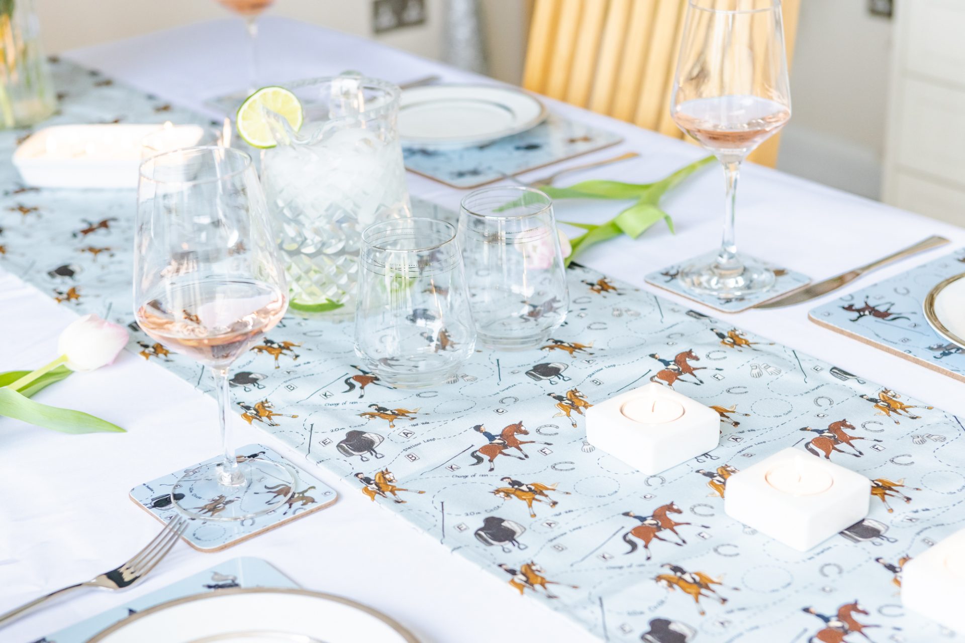 Dressage Horse table runner. Set up on a table with matching placemats and coasters.