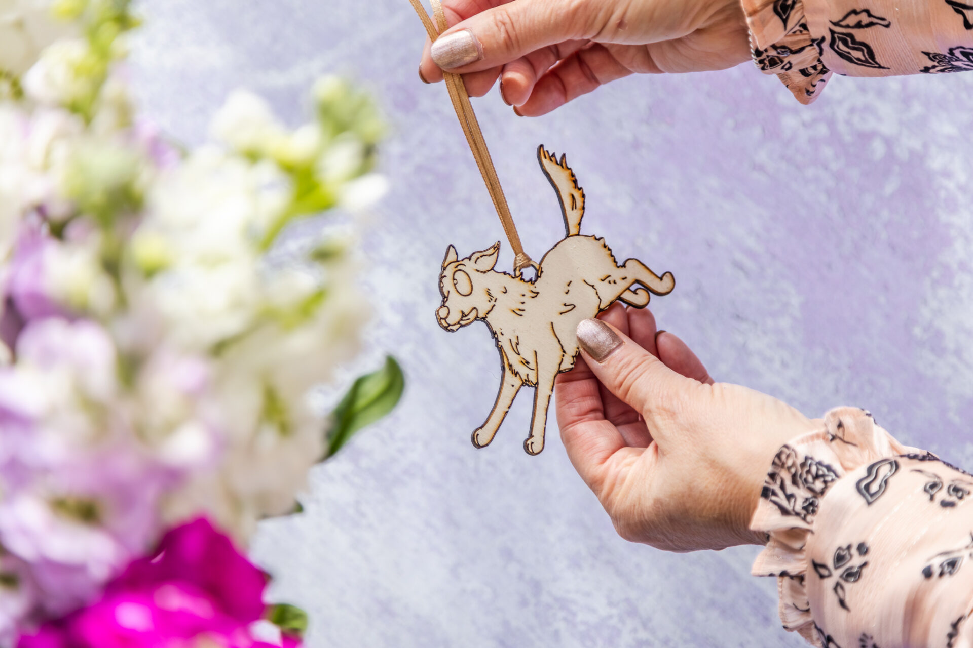 Fluffy dog-shaped wooden decoration with rustic finish.