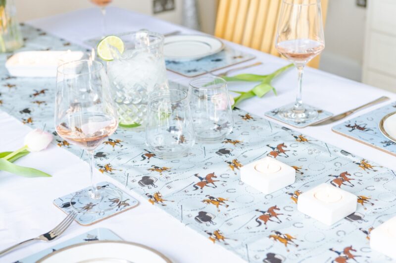 Dressage Horse table runner. Set up on a table with matching placemats and coasters.