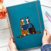 A4 hardback Notebook Two horses reading a book titled '101 expensive and inconvenient things to do'