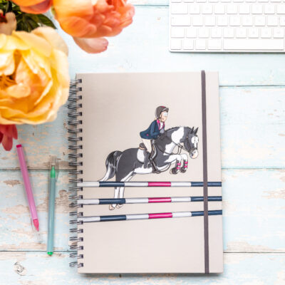 Hardback A4 notebooks with Piebald horse showjumping with rider.