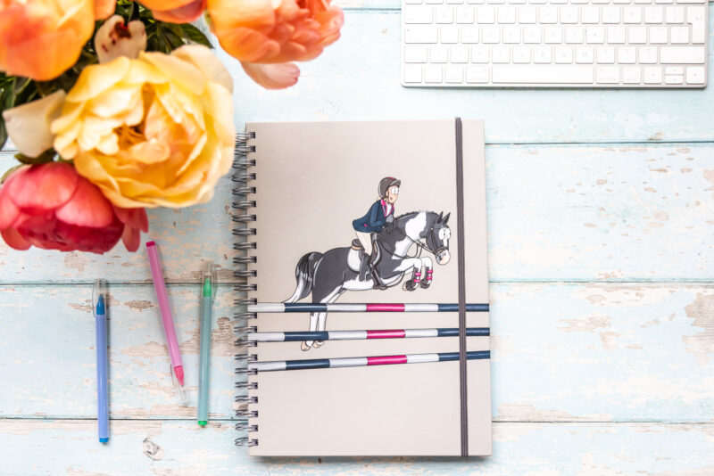 Hardback A4 notebooks with Piebald horse showjumping with rider.