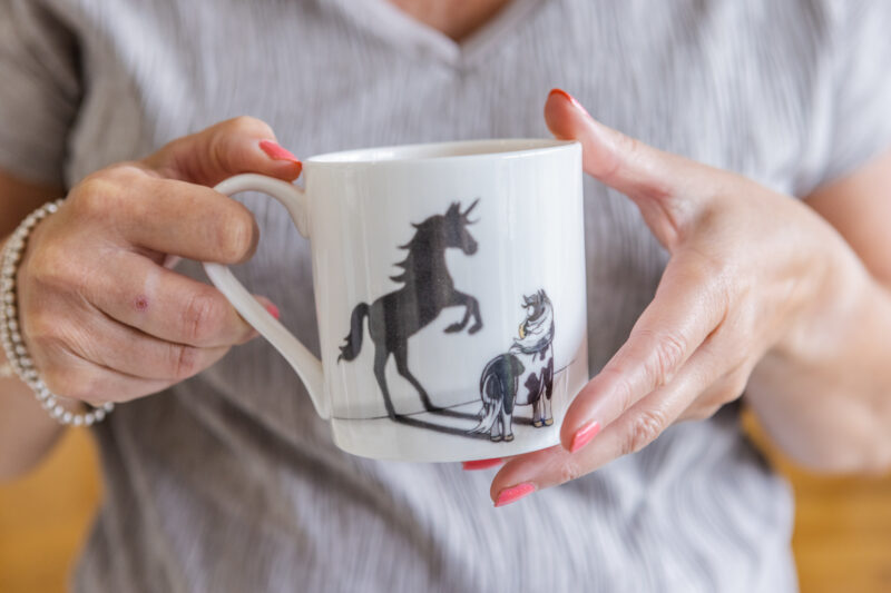 Believe in Yourself Mug. Piebald pony and unicorn shadow.