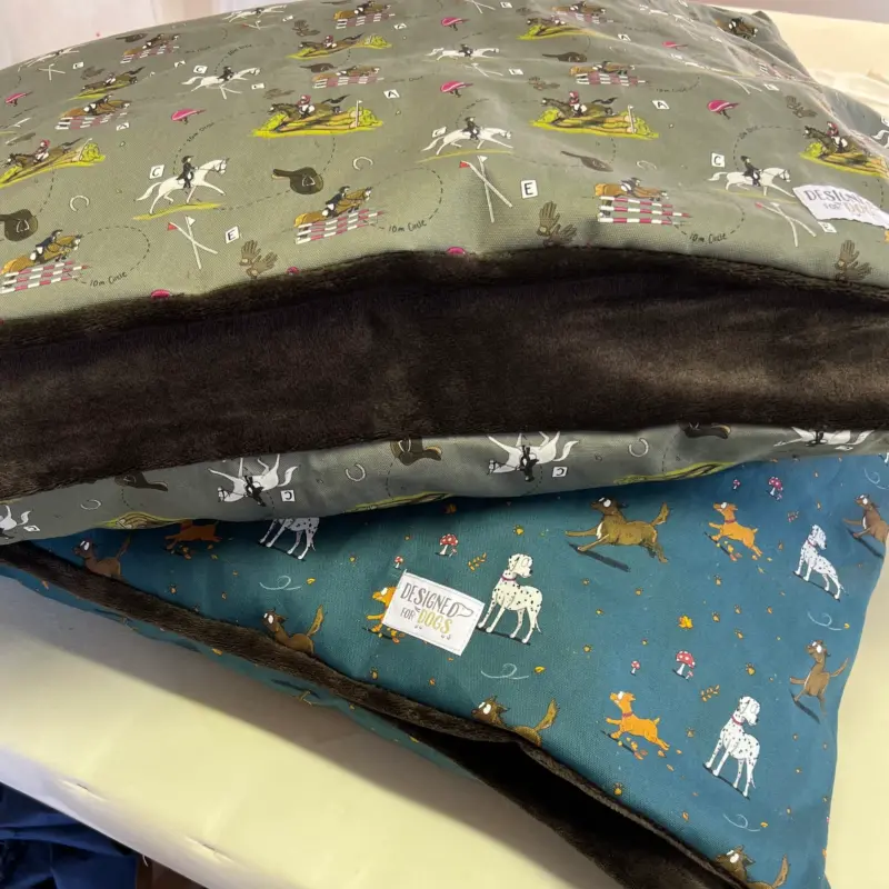 Doggy Den Beds with event horse and countryside dog designs.