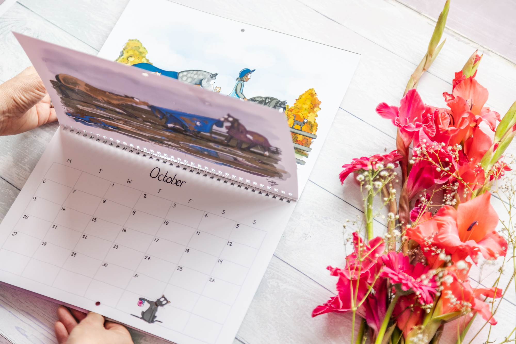 Inside pages of 2025 Horse Wall Calendar by Emily Cole.
