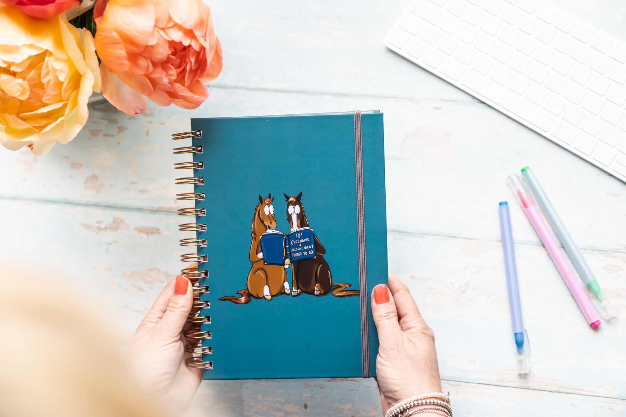 A4 and A5 Western horse notebooks side by side for size comparison