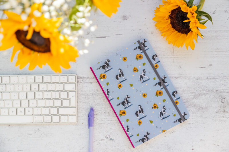 Piebald horses patterned notebook angled view