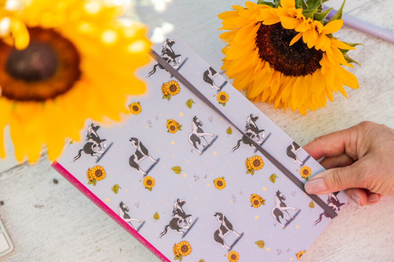 Piebald horses patterned notebook close up view