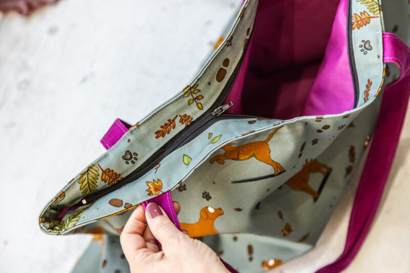 Oversized red fox Labrador Tote Bag by Emily Cole Illustrations. Yellow Labradors on a green background. Lined and zipped tote bag.