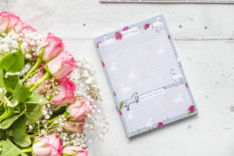 Grey horse pattern on A5 to-do list notepad with lined layout and checkboxes for daily tasks.