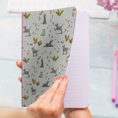 A5 soft cover notebook with black Labrador pattern and pink elastic closure, ideal for notes, journaling, or planning.