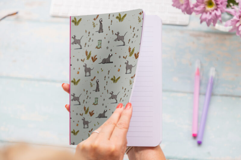 A5 soft cover notebook with black Labrador pattern and pink elastic closure, ideal for notes, journaling, or planning.