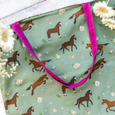 Bay Horse Tote Bag by Emily Cole Illustrations. Brown horse on a green background with pink liner.