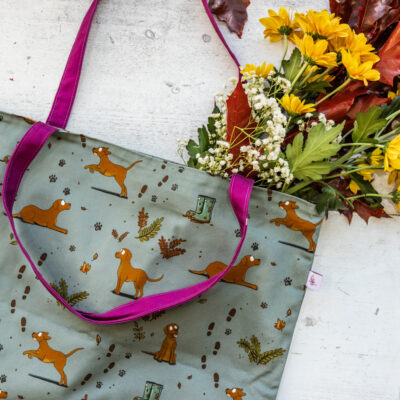 Oversized red fox Labrador Tote Bag by Emily Cole Illustrations. Yellow Labradors on a green background. Lined and zipped tote bag.
