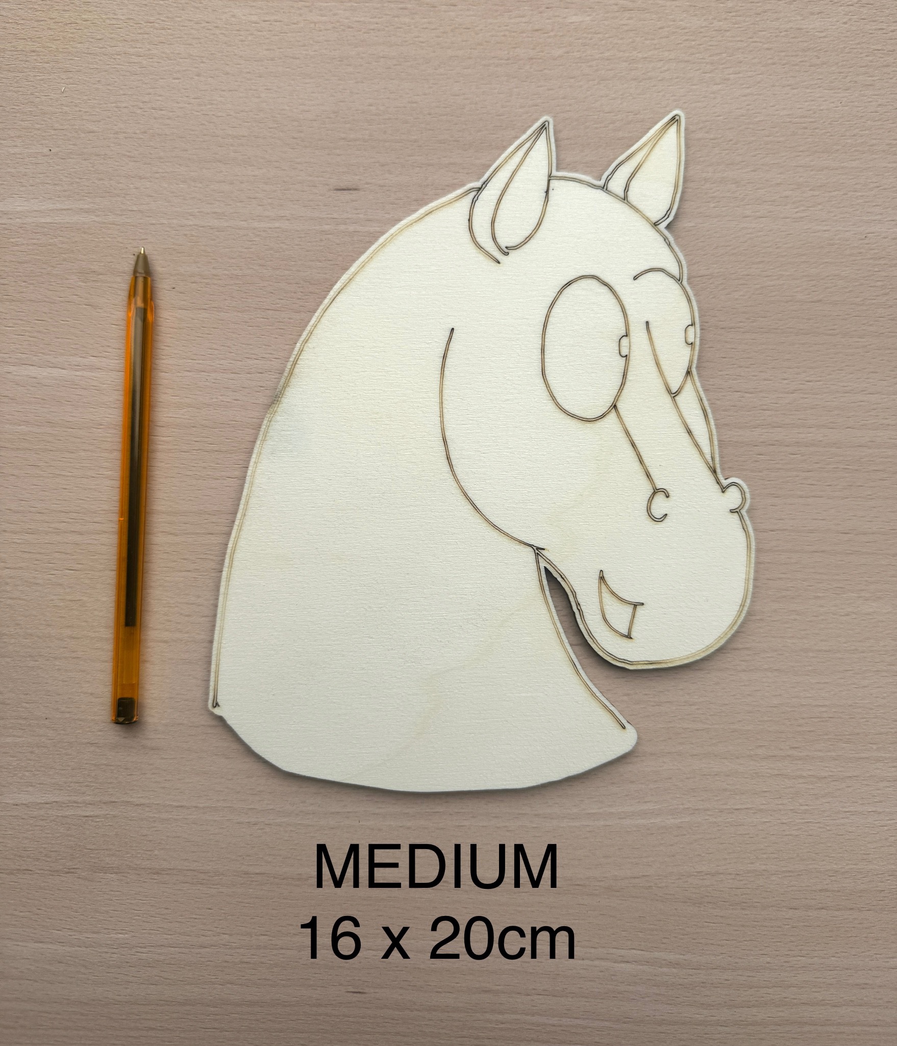 Medium-sized unpainted wooden horse head craft.