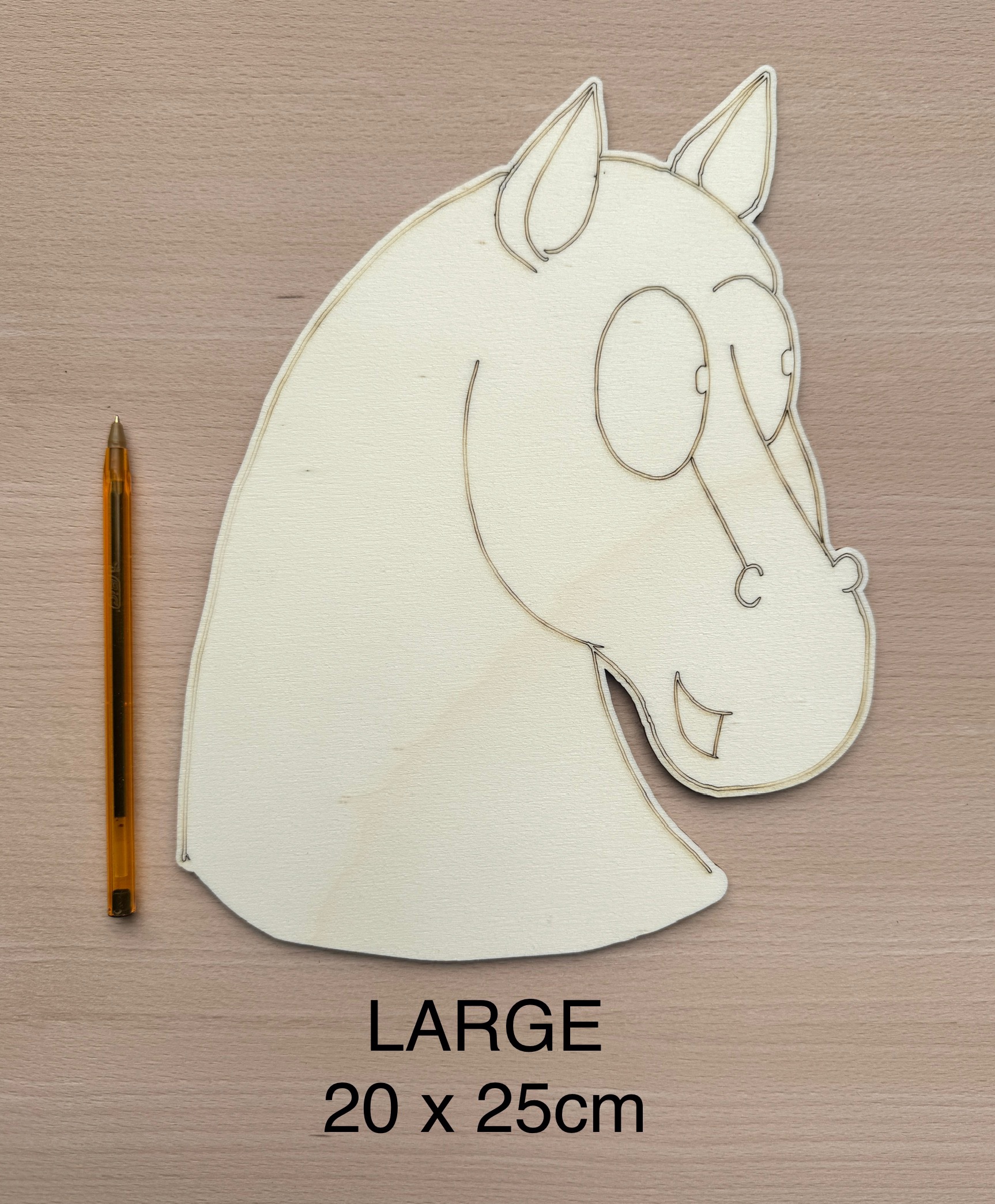 Painted large wooden horse head showing decorative possibilities.