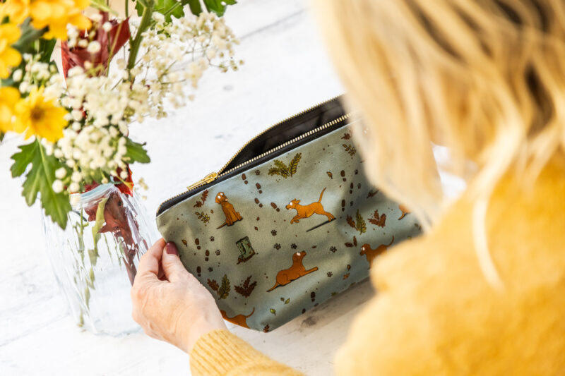 Fox Red Yellow Labrador patterned wash bag by Emily Cole Illustrations on a sage green background