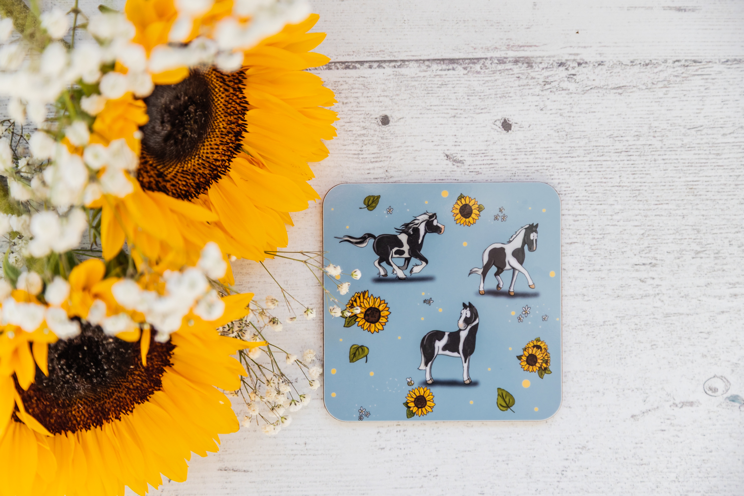 Striking Piebald Horse & Sunflower Patterned Melamine Coaster by Emily Cole Illustrations.