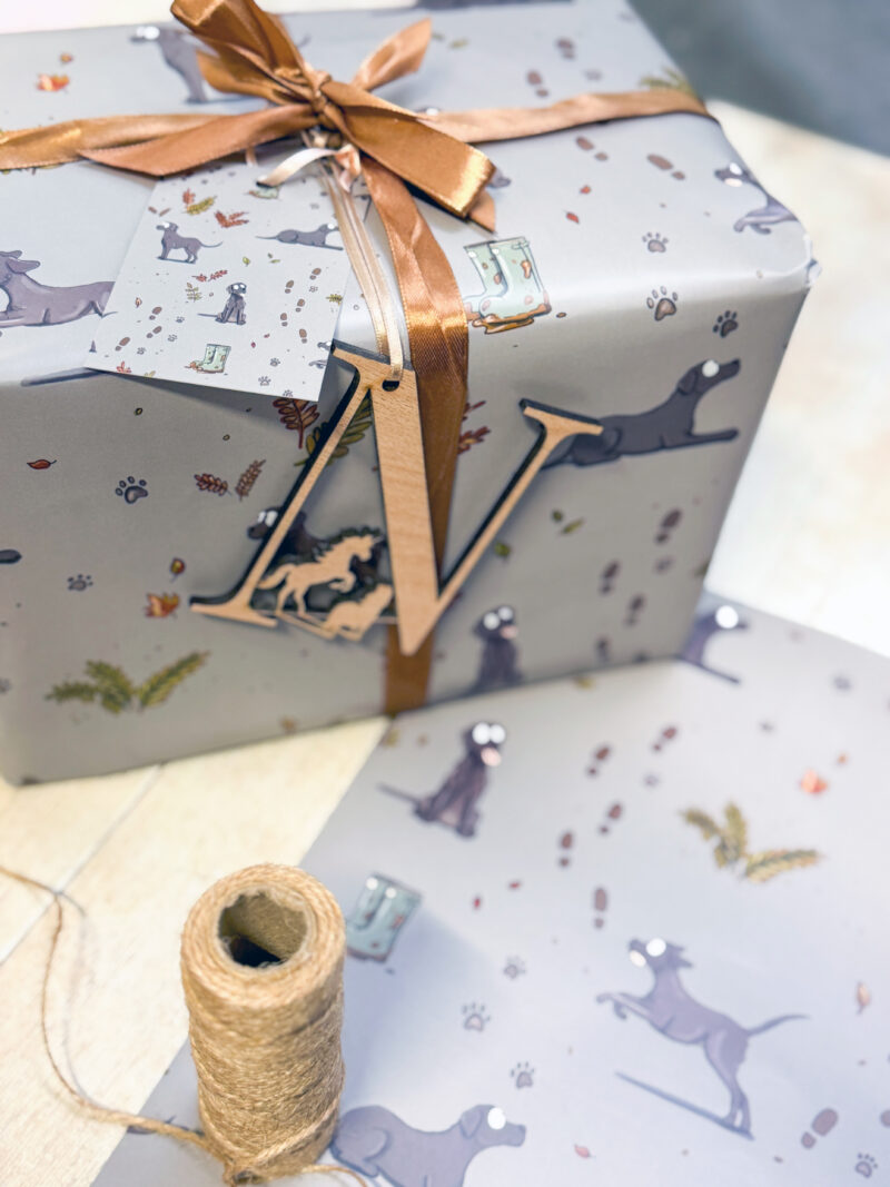 Black Labrador gundog dog illustrated wrapping paper by Emily Cole Illustrations close up