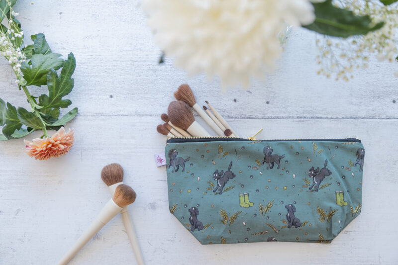 Beautiful Black Spaniel Patterned Cotton Washbag, with Brass Zip by Emily Cole Illustrations.